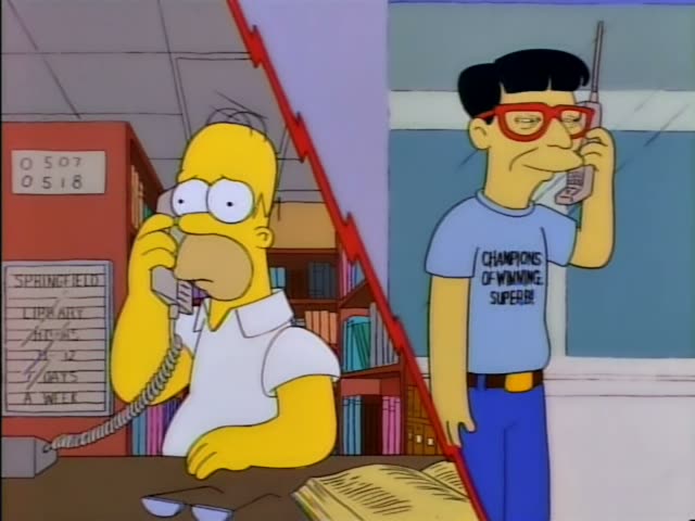 Homer Simpson sits at a library desk with a corded phone to his ear, eyes wide and then grimacing, while a young man…