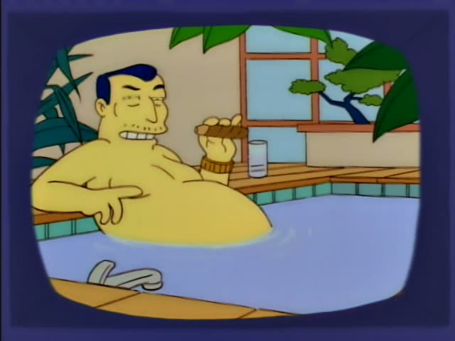 A heavy, shirtless man with dark hair and a moustache sits in a pool, holding a cigar and gesturing with his other hand…