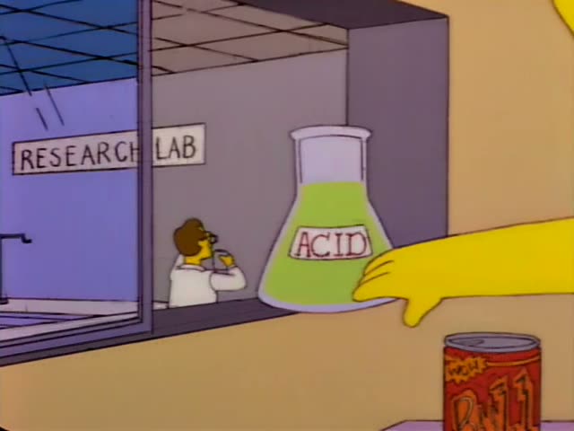 Homer in a white lab coat is seated at a counter in a break room while Lenny shouts at him and points