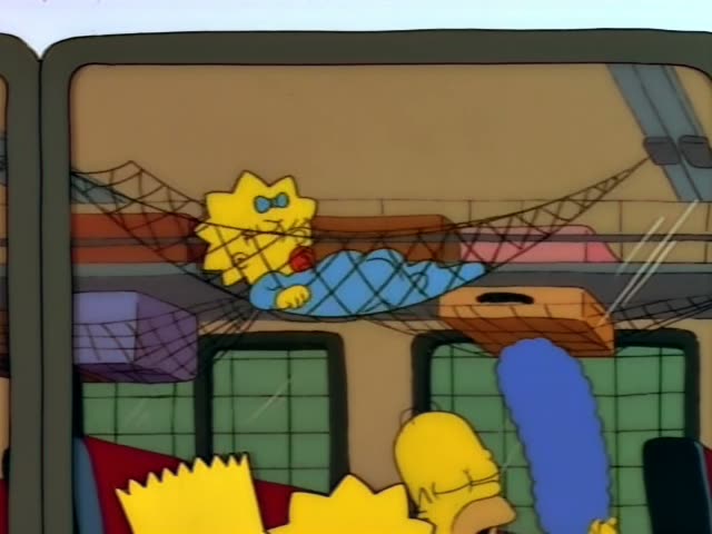 Bart, Lisa, Homer and Marge sit in a bus seat row while Maggie lies in a hammock strung across the luggage rack above them