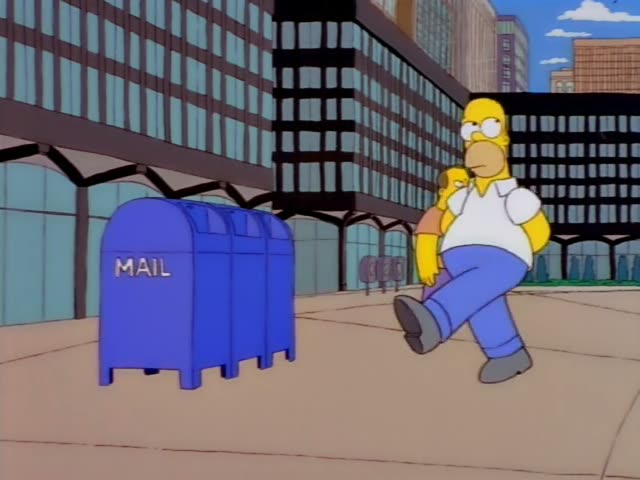 Homer kicks at and then squares off with a mail carrier in a blue cap, shorts and satchel beside a blue MAIL box on a plaza…