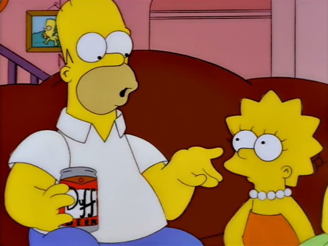 Homer sits on a red couch holding a Duff beer can, gesturing and talking, then tips the can back to drink