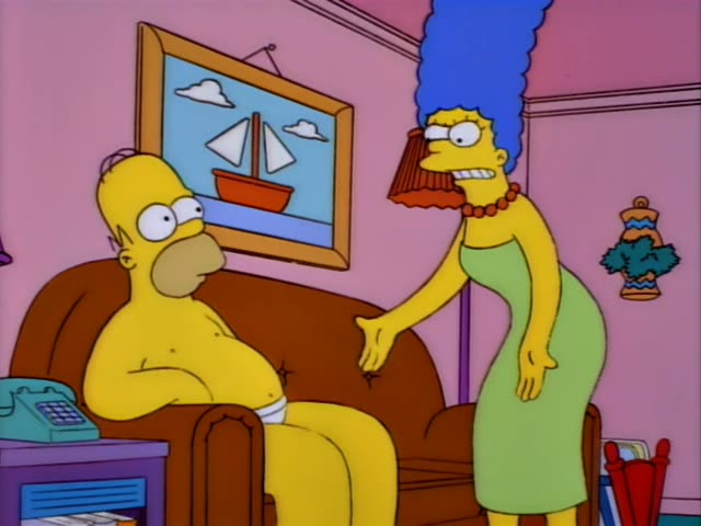 Homer and Marge are in the living room