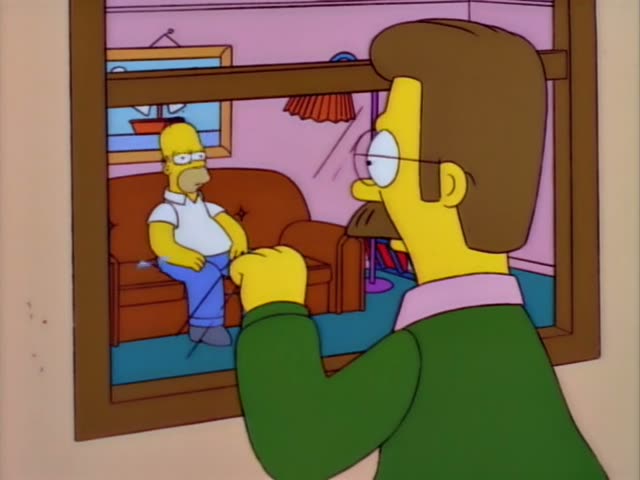 Ned Flanders stands outside a window and looks in at Homer, who is bald and wears a white shirt, sitting at a table…