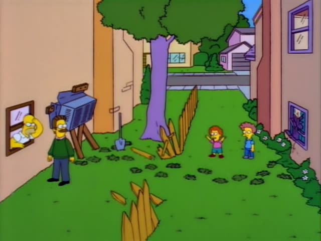 Homer watches a man in a green sweater with a moustache and glasses stand in a backyard beside a blue machine on a wooden…