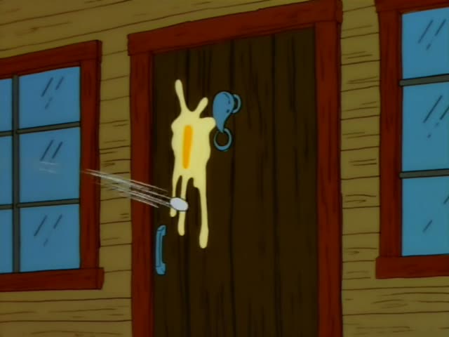 Homer stands in the middle of a crowd of trick-or-treaters on a lawn in front of the Simpson house at night, with Lisa…
