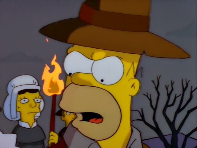 A man in a tall brown hat, who looks like Homer, holds a flaming torch with wide eyes and an open mouth beside a woman…