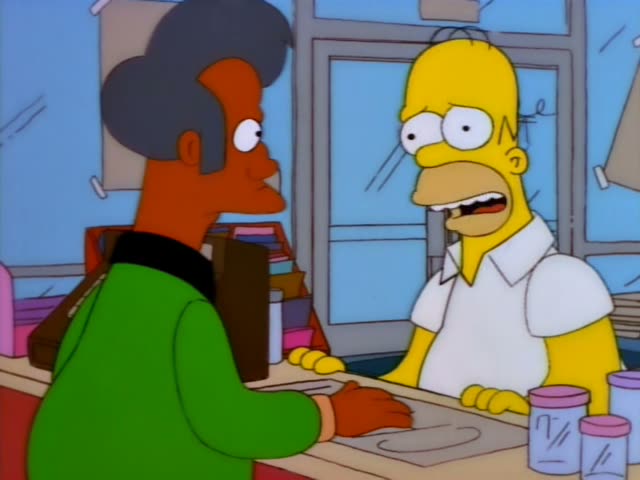 Homer and Apu stand at the Kwik-E-Mart counter, with Apu in a green sweater and Homer in a white shirt and blue pants