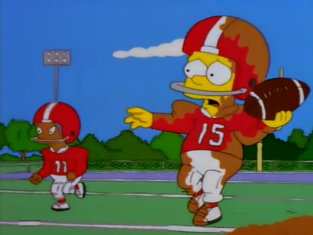 Bart Simpson stands on a grassy football field holding a brown football, and at first he looks ready to throw