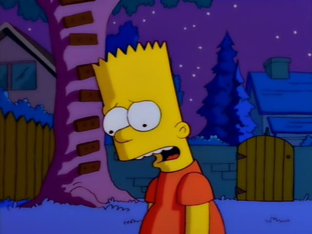 Bart Simpson stands in a snowy yard at night holding a football and looking anxious beside a tree and a wooden fence