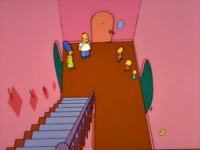 Inside the pink upstairs hallway with a staircase railing in the foreground and an orange arched door at the back, Marge…