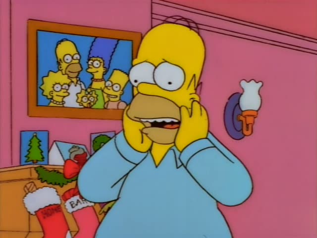 Homer Simpson stands in the pink living room near a fireplace hung with Christmas stockings, a family portrait, and a wall…