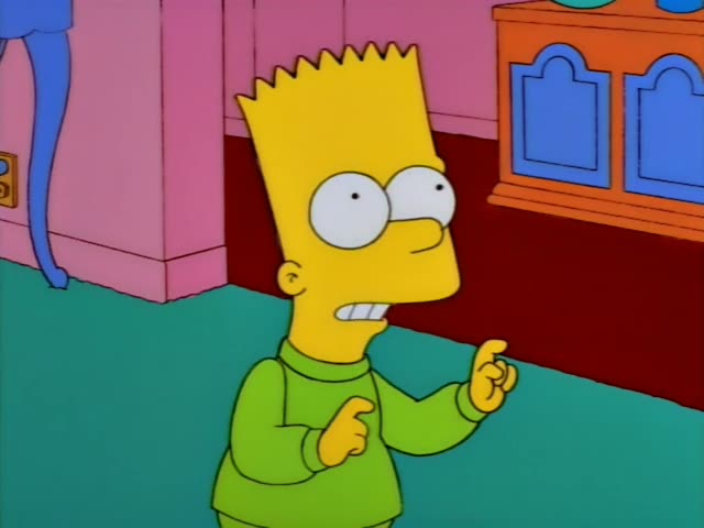 Bart Simpson stands on a teal carpet in a room with a pink wall and an orange cabinet with blue doors behind him…