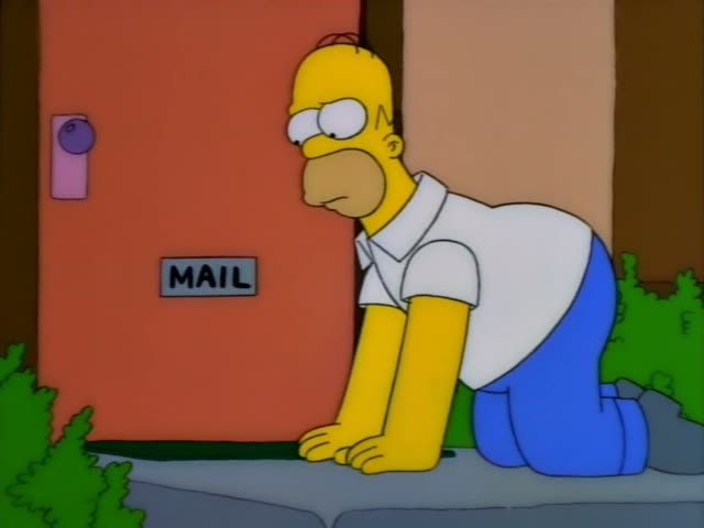 Homer Simpson crouches on a front walkway beside an orange door with a MAIL slot labeled MAIL, first looking down…