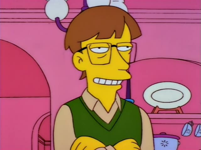 Homer sits at a purple table with his mouth open while a heavy man in a light blue shirt grips his arm and a man…