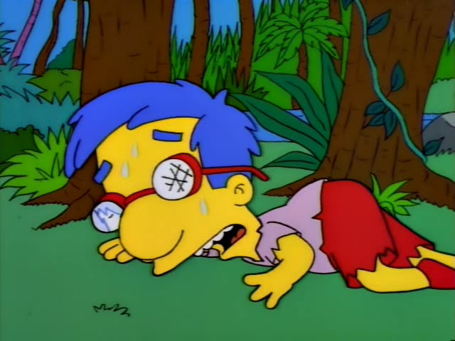 Milhouse lies sweating in a jungle clearing in a red dress-like outfit while Bart in an orange shirt and blue shorts…
