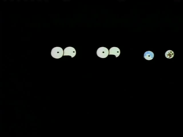 Bart, Lisa and Milhouse and the blue-haired boy with glasses, huddle together wide-eyed and frightened in a dark cave