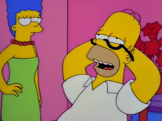 Homer Simpson and Marge Simpson stand in a pink room beside a red decorative plant