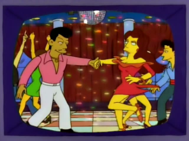 Inside a TV screen framed in purple, a dark-haired man in a pink shirt and white pants dances with a woman in a red dress…