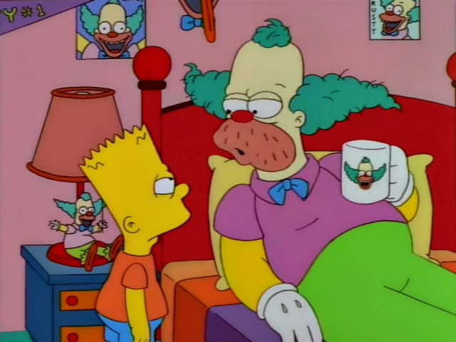 Bart Simpson stands beside a blue nightstand in a pink bedroom while Krusty the Clown lies propped up on a red-and-yellow…