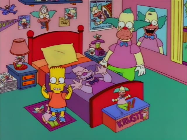 Bart and Krusty the Clown figurines, a lamp and a snow globe