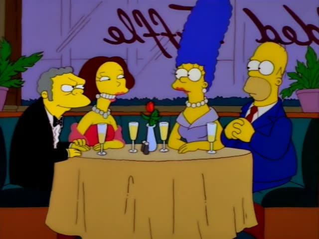 Marge sits at a restaurant table across from Homer, bald and wearing a blue suit and red tie, while a grey-haired man…