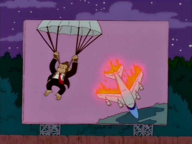 Homer is seen in a purple car at a drive-in theater, first watching a billboard where a monkey in a tuxedo parachutes…