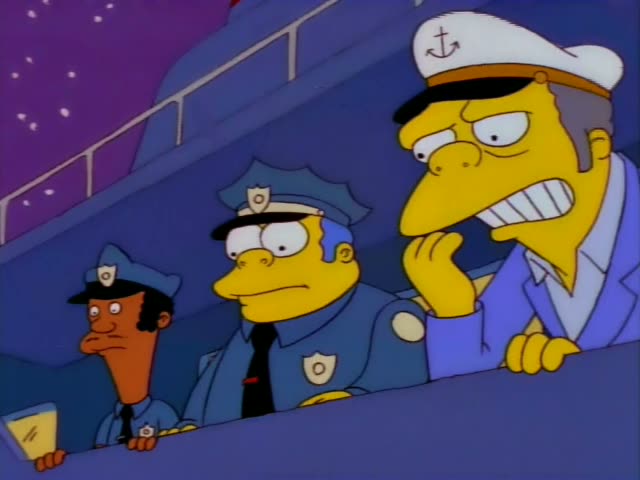 Chief Wiggum stands at a ship's railing at night beside a dark-skinned police officer and a man in a white captain's cap…