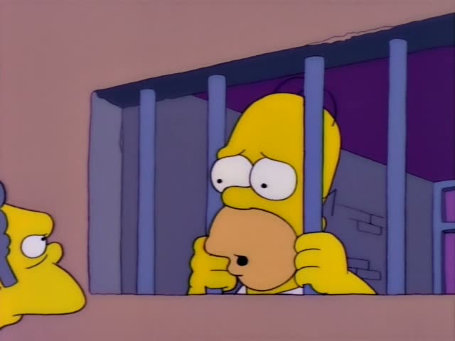 Homer clutches the bars and chews a donut while looking worried, with Moe, the grey-haired bartender, standing…