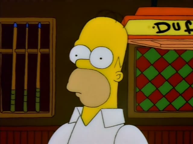 Homer Simpson stands at the bar of Moe's Tavern, where Moe faces him across the counter holding a mug of beer