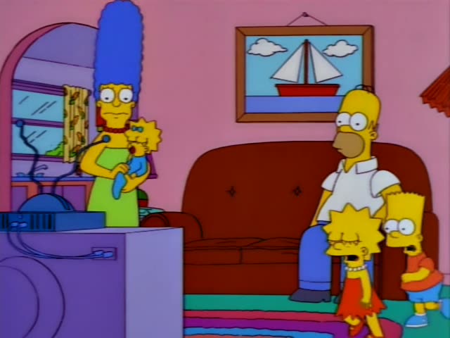 Homer, Marge, Lisa, Bart, Maggie and Grampa stand in the living room in the first frames, with Homer seated on the brown…