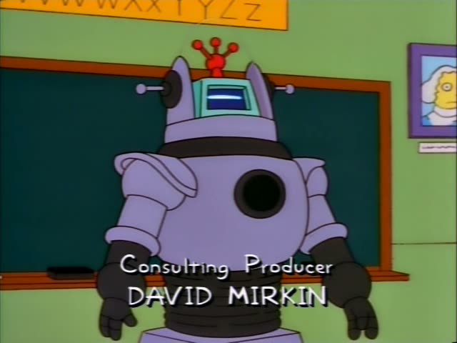 Milhouse first appears in a close-up in front of a doorway, then stands on a grey planet in a blue starry void…