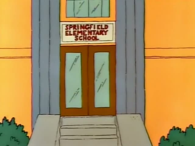 Bart Simpson is at Springfield Elementary School, where the sign reads SPRINGFIELD ELEMENTARY SCHOOL above the brown double…