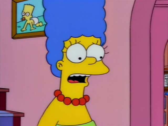 Marge Simpson and Bart Simpson stand in a pink room with an arched doorway, a framed still life painting of a vase and red…
