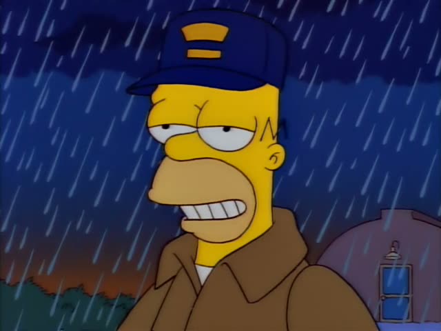 Homer stands alone in heavy rain at night, grimacing and then looking off to the side