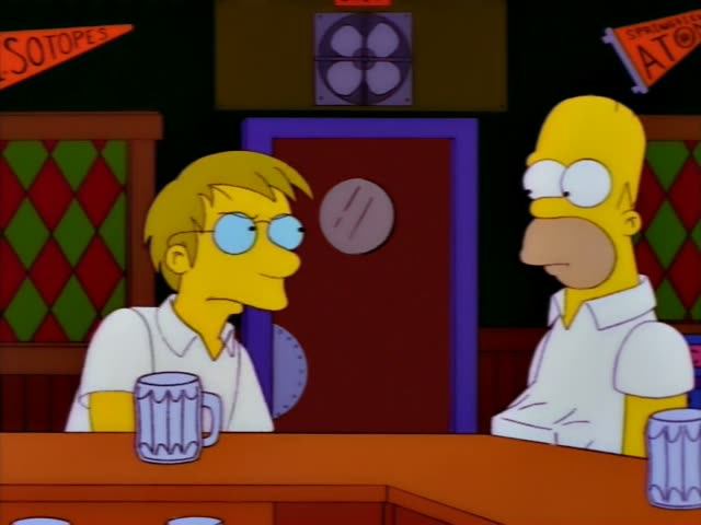 Homer sits at the bar beside a blond, bespectacled man in a white shirt, and two men in white shirts and dark ties come…