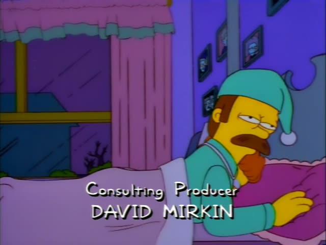 Ned Flanders lies in bed and then sits up beside a woman with frizzy orange-red hair who lies under a pink blanket…