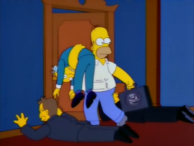 Homer fights in a hallway beside a wooden door, swinging a black briefcase with a combination lock