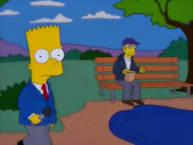A spiky-haired yellow-skinned boy in a blue blazer and red tie stands at the left holding a microphone, speaking…