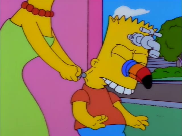 Marge and Lisa stand beside Bart, the spiky-haired boy in an orange shirt, at a pink door outside a house with a green lawn