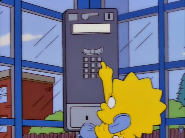 Lisa Simpson stands in a glass-walled booth on a blue-framed building, holding a blue payphone receiver to her ear