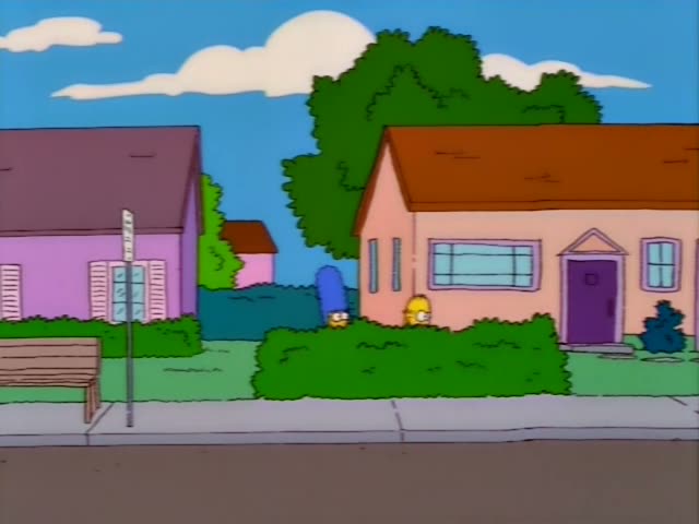 Marge Simpson and Homer Simpson appear in a sunny suburban street outside the pink house with the purple front door…