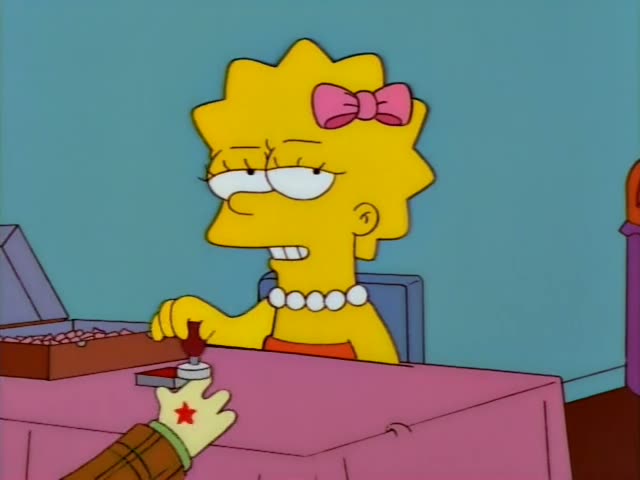 Lisa Simpson sits at a pink-draped ticket table in a blue hallway, pearl necklace on, stamping hands from a red stamp pad…