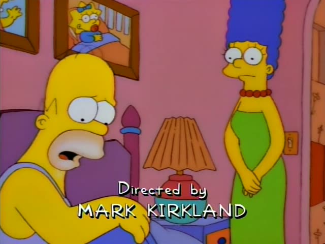 Homer sits up in bed while Marge stands beside him in a pink bedroom with a lamp and a framed picture of Maggie