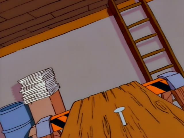 Homer saws a board on a workbench in a cluttered attic, then welds with a glowing torch while wearing a dark welding helmet