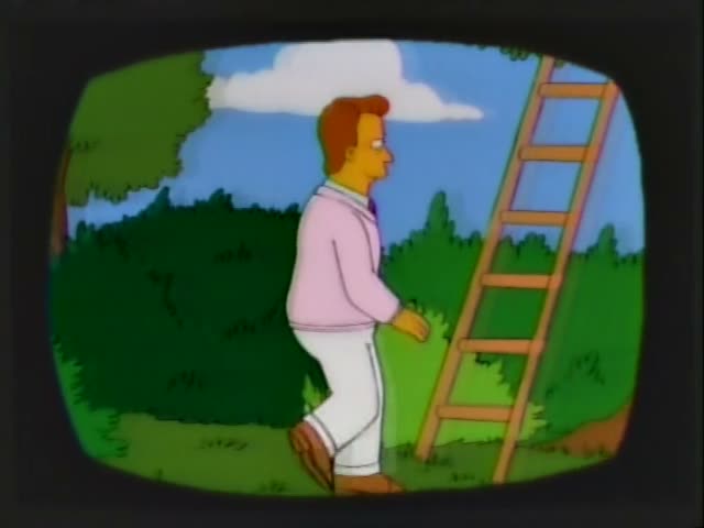 A man with reddish-brown hair, a pink sweater, a maroon tie and white trousers walks across a grassy yard, then climbs…