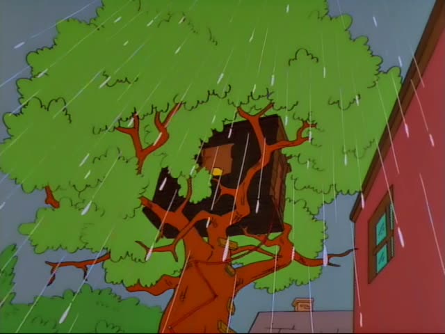 Bart sits on a purple wooden crate inside a wooden treehouse while rain falls past the window and a tree branch and leaking…