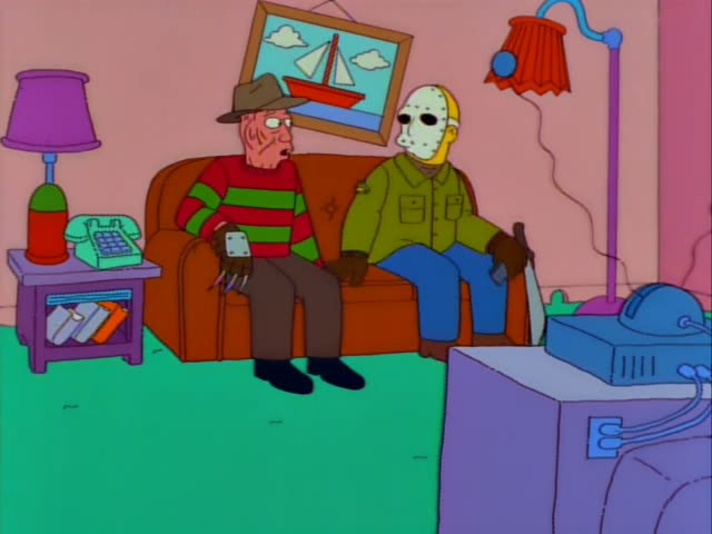 Two characters who are not Simpsons regulars sit on a brown couch in a living room: on the left a figure in a brown fedora…
