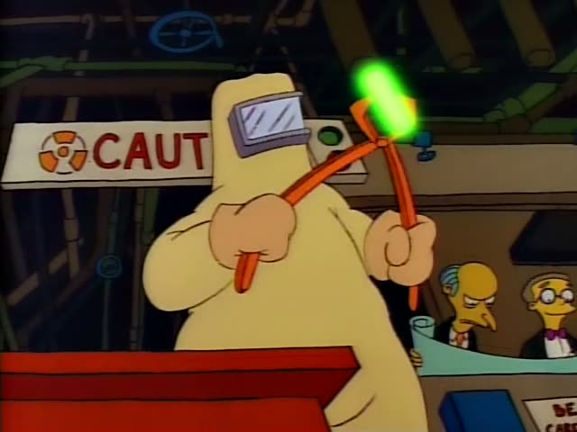 Homer stands at a red counter under a CAUTION sign in the nuclear plant, a glowing green rod in his hand, while Mr. Burns…