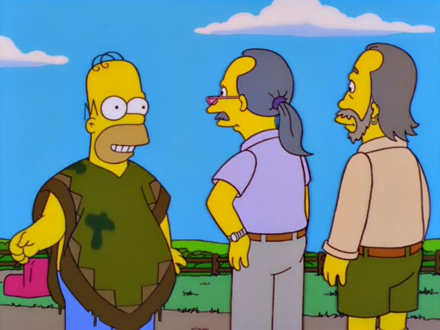 Homer stands on a farm beside a red barn and a yellow house with a grey-haired man with a ponytail, glasses and lavender…